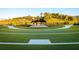 Expansive lawn featuring an open air amphitheater, perfect for outdoor events and community gatherings at 4710 Crestline View Rd, Cumming, GA 30028