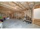 Spacious unfinished basement with concrete floors and framed walls, ready for customization and expansion at 9117 Hanover St, Lithia Springs, GA 30122