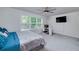Bedroom with natural light, featuring a dedicated workspace and comfortable sleeping area at 9117 Hanover St, Lithia Springs, GA 30122