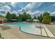The community pool features a mushroom fountain and various lounging areas at 9117 Hanover St, Lithia Springs, GA 30122
