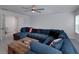 Comfortable living room featuring a large sectional sofa, creating a cozy gathering space at 9117 Hanover St, Lithia Springs, GA 30122