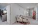 Open loft area with seating, neutral-toned walls, and doorways to other rooms at 9117 Hanover St, Lithia Springs, GA 30122