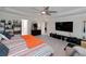 Spacious main bedroom featuring a tray ceiling, neutral colors, and ample space for relaxation at 9117 Hanover St, Lithia Springs, GA 30122