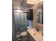Bathroom features shower, vanity, and built-in cabinet at 1236 S Shadygrove Ct, Stone Mountain, GA 30083