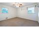 A bedroom with wall storage and carpet at 1236 S Shadygrove Ct, Stone Mountain, GA 30083