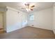 A bedroom with closet and carpet at 1236 S Shadygrove Ct, Stone Mountain, GA 30083