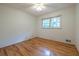 A bedroom with hardwood floors and a ceiling fan at 1236 S Shadygrove Ct, Stone Mountain, GA 30083