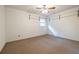 A bedroom with wall storage and carpet at 1236 S Shadygrove Ct, Stone Mountain, GA 30083