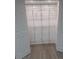 This is a closet with organized shelving with gray wood floors at 1236 S Shadygrove Ct, Stone Mountain, GA 30083