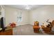 Playful bedroom with neutral walls, soft carpet, a ceiling fan, and furniture at 820 Airline Rd, Mcdonough, GA 30252