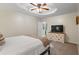 Comfortable bedroom featuring soft carpet, a ceiling fan, and neutral decor at 820 Airline Rd, Mcdonough, GA 30252