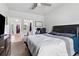 Bedroom with ceiling fan with attached bathroom at 140 Canyons Ct, Hampton, GA 30228
