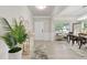 Bright entryway featuring a decor and a view into the dining area at 140 Canyons Ct, Hampton, GA 30228