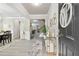 Grand foyer with decorative accents, elegant lighting and grey flooring at 140 Canyons Ct, Hampton, GA 30228