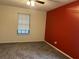 Carpeted bedroom featuring window with blinds at 1455 Stone Mill Trce, Stone Mountain, GA 30083