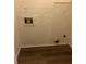Bare utility room with hardwood flooring at 1455 Stone Mill Trce, Stone Mountain, GA 30083