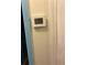 Image shows a digital thermostat mounted on a wall at 1455 Stone Mill Trce, Stone Mountain, GA 30083