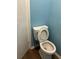 Small toilet room with a standard toilet at 1455 Stone Mill Trce, Stone Mountain, GA 30083