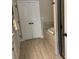 Bathroom with a soaking tub, tiled floors, and a shower with black trim at 1790 Nestledown Dr, Cumming, GA 30040
