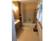 Full bathroom featuring a tub/shower combo, ample storage cabinets, and a neutral color scheme at 1195 Christian Circle, Conyers, GA 30013