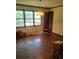 The living room has hardwood floors, windows, and a door at 1195 Christian Circle, Conyers, GA 30013