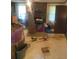 This living room is messy and full of moving boxes at 1195 Christian Circle, Conyers, GA 30013