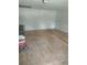 Unfinished living space with wood subfloor, ready for renovation and customization to your needs at 1195 Christian Circle, Conyers, GA 30013