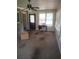 Sunroom with brick accent wall, multiple windows and door leading outside, ready for a refresh at 1195 Christian Circle, Conyers, GA 30013