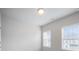 Bedroom with neutral walls, and two windows that let in natural light at 1505 Slopeside Loop, Smyrna, GA 30082