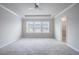 Spacious bedroom with plush carpeting, tray ceilings and ample natural light at 1505 Slopeside Loop, Smyrna, GA 30082