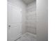 Closet with wire shelving and gray tile floor at 1505 Slopeside Loop, Smyrna, GA 30082