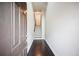 Inviting foyer featuring dark hardwood floors and a staircase leading to the upper level at 1505 Slopeside Loop, Smyrna, GA 30082
