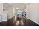 Open-concept kitchen with modern lighting, stainless steel appliances, and a large island at 1505 Slopeside Loop, Smyrna, GA 30082