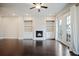 Living room featuring a fireplace, hardwood floors, and recessed lighting at 1505 Slopeside Loop, Smyrna, GA 30082