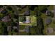 Aerial view of property showing the house and its approximate .28 acre lot size, nestled in a neighborhood with mature trees at 5832 Sycamore Ridge Dr, Sugar Hill, GA 30518