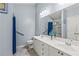 Bathroom with dual sinks, tile floor, and a large mirror at 5832 Sycamore Ridge Dr, Sugar Hill, GA 30518