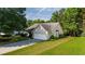 Charming single-Gathering home with well-maintained lawn and attached two-car garage at 5832 Sycamore Ridge Dr, Sugar Hill, GA 30518
