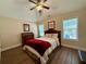 Comfortable bedroom features ceiling fan and large windows that provide ample lighting at 112 Countryside Ct, Woodstock, GA 30189