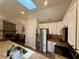 Modern kitchen with stainless steel appliances, granite countertops, and a skylight at 112 Countryside Ct, Woodstock, GA 30189