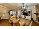 Inviting living room features stone fireplace, wood floors, and comfortable seating at 112 Countryside Ct, Woodstock, GA 30189
