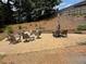 Wide patio featuring an outdoor dining and lounge area surrounded by trees at 112 Countryside Ct, Woodstock, GA 30189