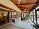 Inviting sunroom with cozy seating and lovely views of the yard at 112 Countryside Ct, Woodstock, GA 30189