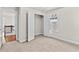 Bedroom showcasing a closet with double doors and convenient access to the hallway at 4020 Townsend Ln, Atlanta, GA 30346