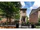 Brick townhome with charming architectural details and manicured landscaping at 4020 Townsend Ln, Atlanta, GA 30346