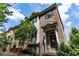 Beautiful brick townhome with well-manicured landscaping and charming entryway at 4020 Townsend Ln, Atlanta, GA 30346