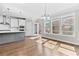 Bright kitchen with a view of stainless steel appliances, bar seating, and a wall of windows for natural light at 4020 Townsend Ln, Atlanta, GA 30346