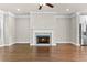 Bright living room featuring a fireplace and hardwood flooring at 4020 Townsend Ln, Atlanta, GA 30346