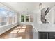 The living room offers hardwood floors, multiple windows for natural light, and access to the staircase at 4020 Townsend Ln, Atlanta, GA 30346
