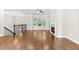 Spacious living room with hardwood floors, fireplace, and natural light at 4020 Townsend Ln, Atlanta, GA 30346