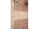Close-up of shower with multi-colored, rectangular tile and modern shower head at 1305 Clay Sw Rd, Mableton, GA 30126